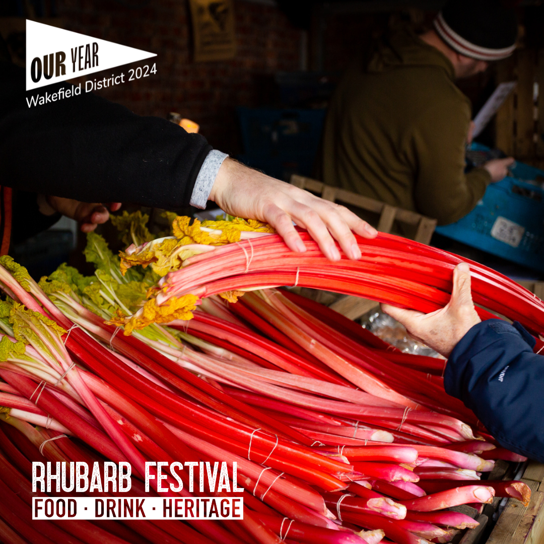 A hand holding a bunch of rhubarb stalks. Overlaid text reads Rhubarb Festival Food Drink Heritage.