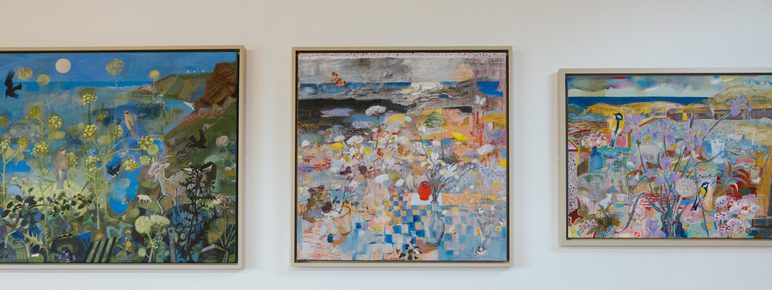 Three framed abstract paintings depicting birds and foliage, displayed on a white gallery wall.