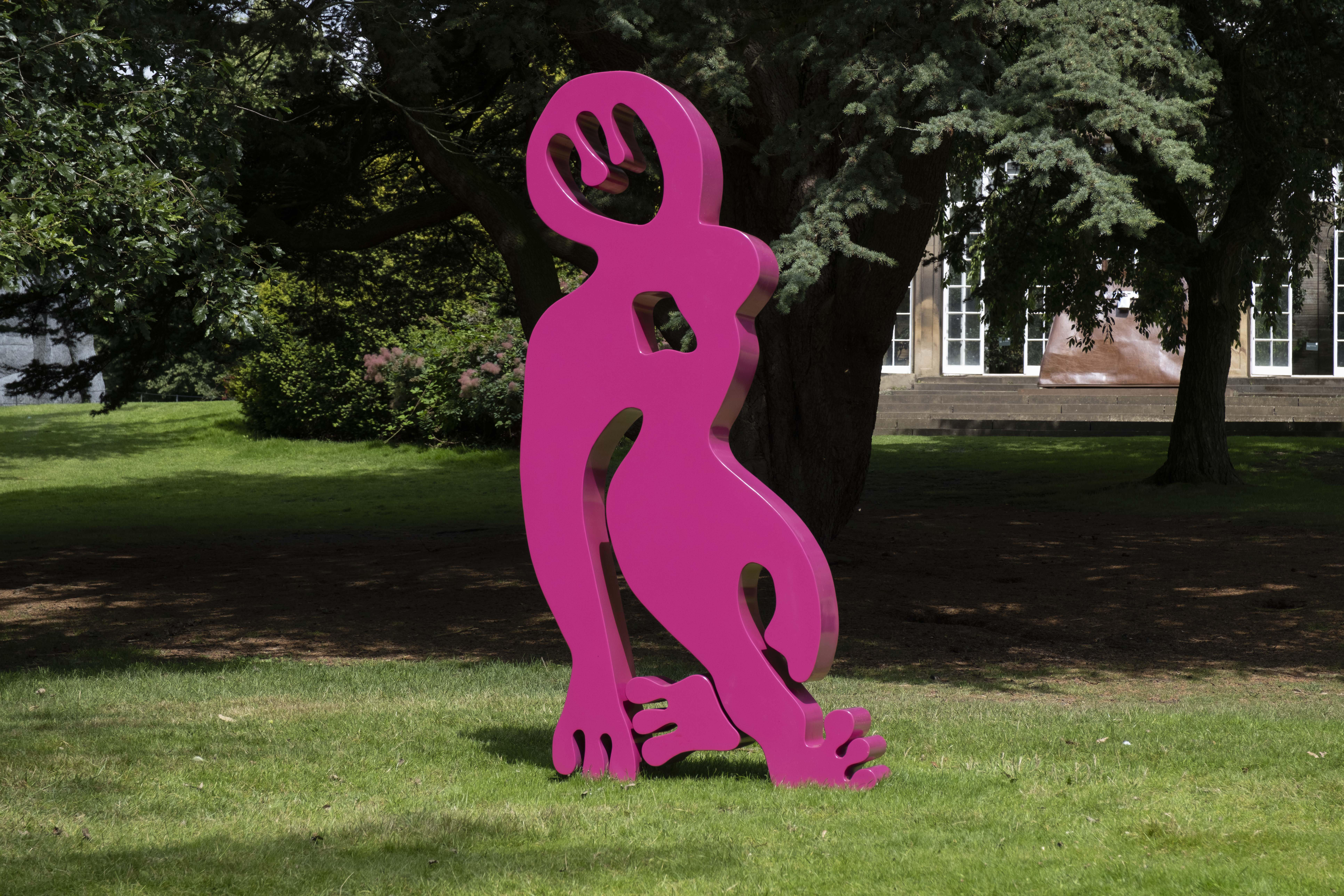 A bright pink abstract sculpture