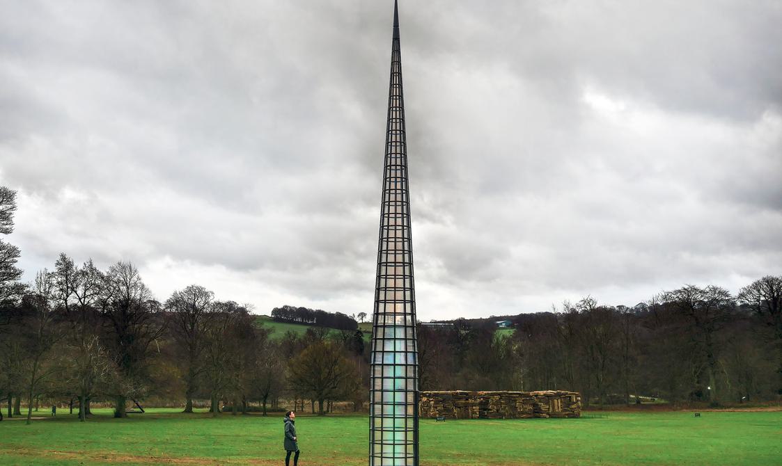 A visitor looking up at Kimsooja – A Needle Woman 2014 at Yorkshire Sculpture Park