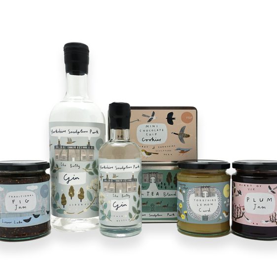 A display of bottles, jars and tins of YSP branded food products, with illustrated labels.