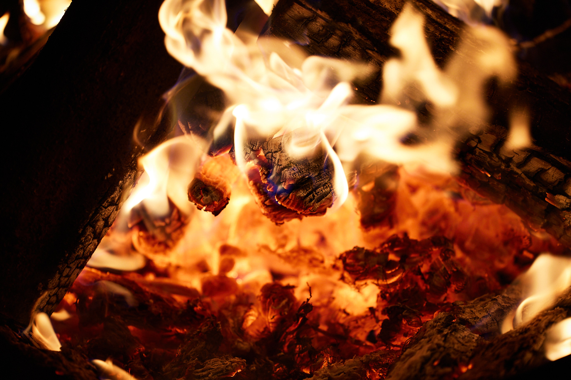 A close up of a burning fire pit