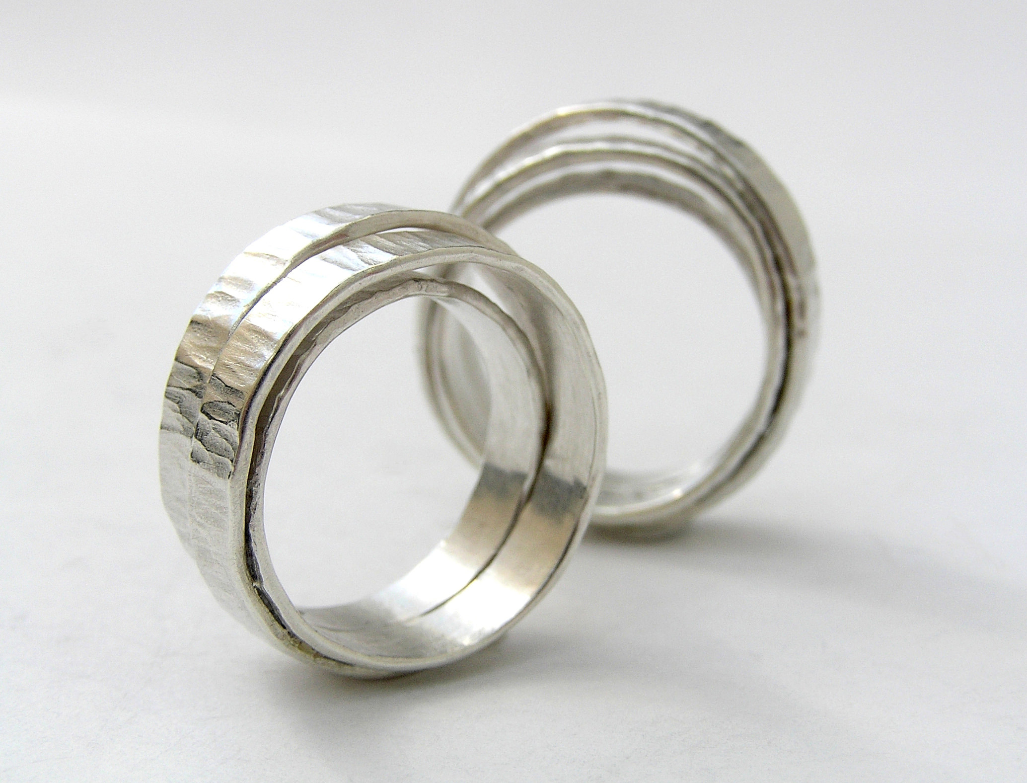 A pair of stacked silver rings