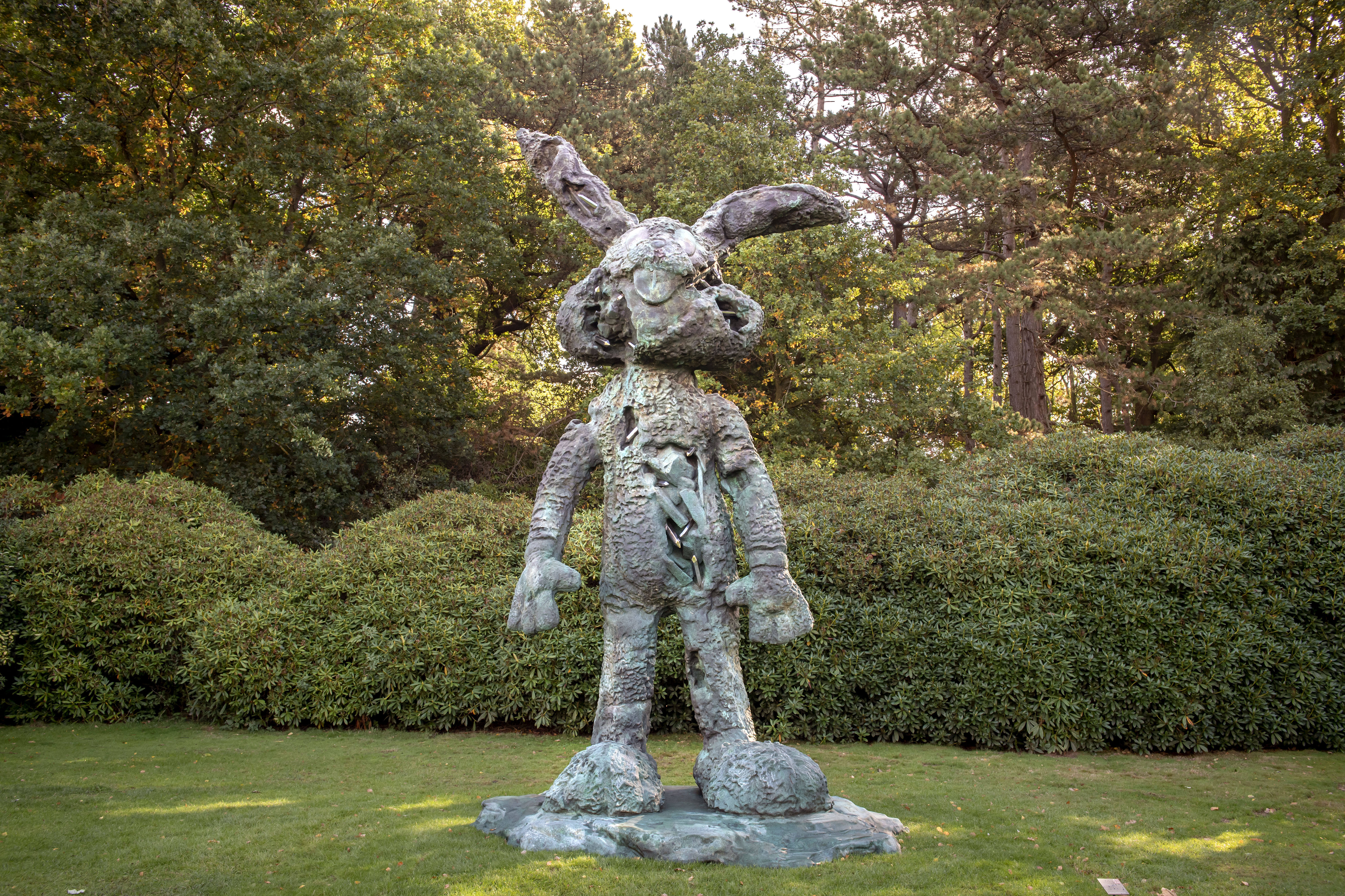 A sculpture of a giant Bugs Bunny shaped soft toy, with eroded crystal sections.