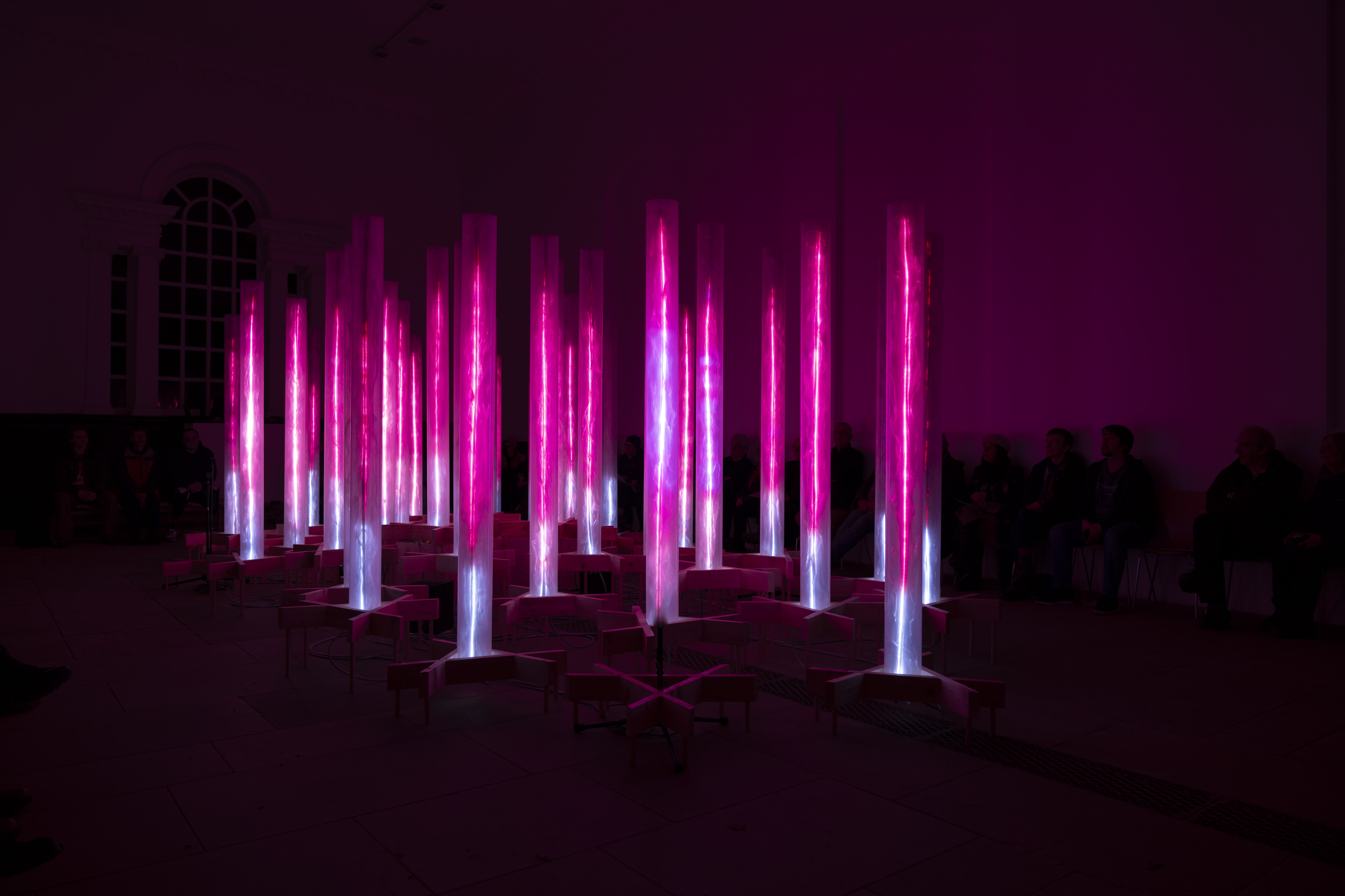 A collection of pink glowing columns