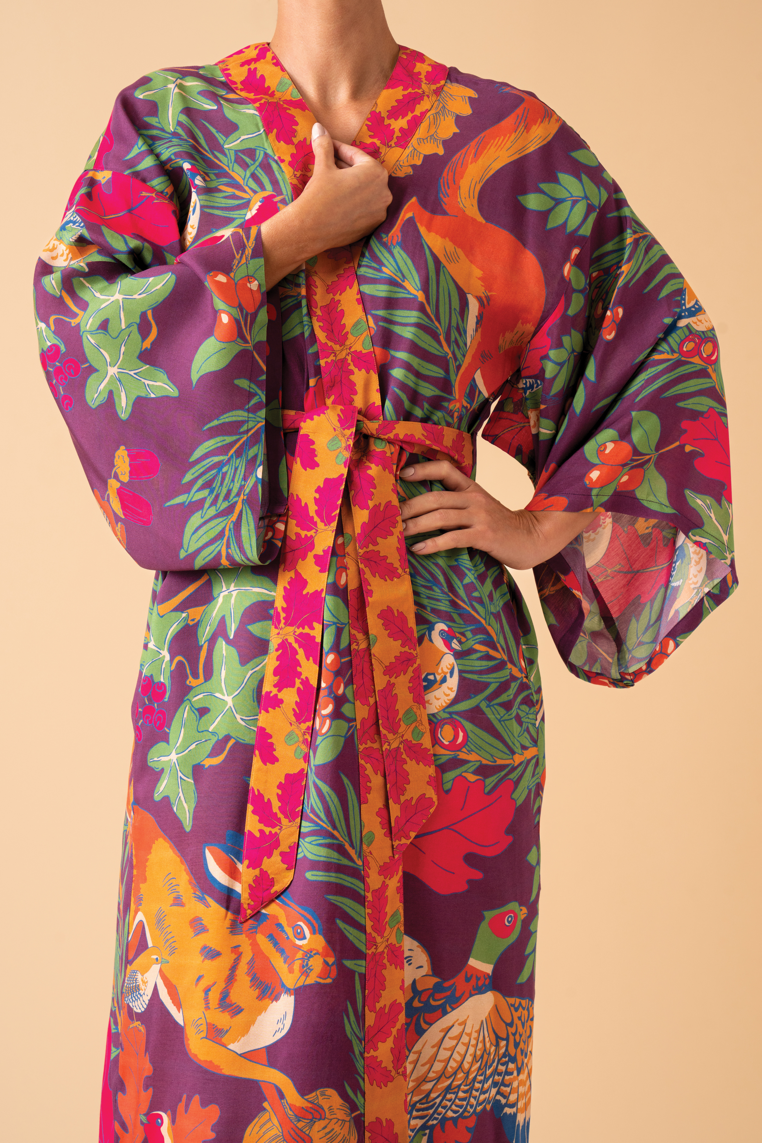 Multicoloured floral print dressing gown, modelled on a woman