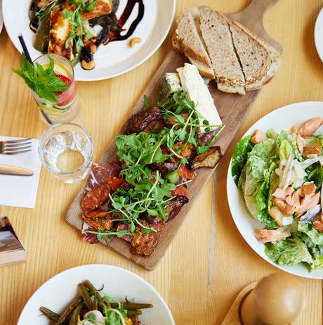 A table of small plates and tapas boards