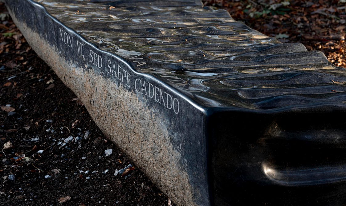 Detail of Willem Boshoff – Flagstone 2016 which reads "Gutta cavat Lapidem,"at Yorkshire Sculpture Park