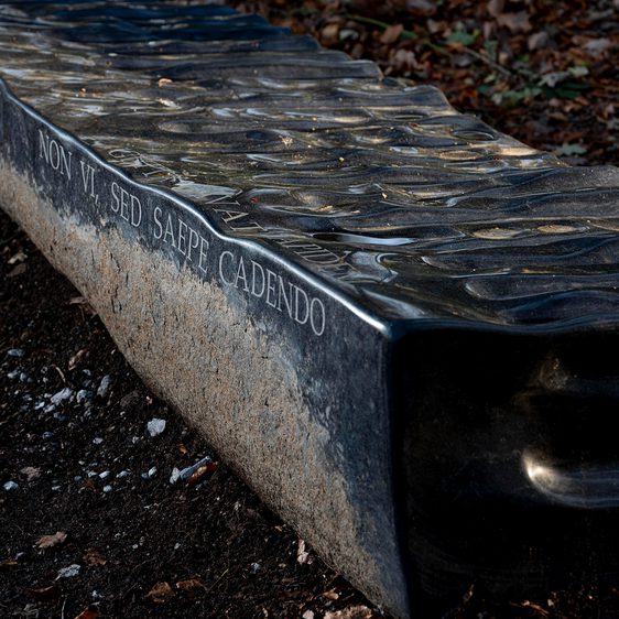 Detail of Willem Boshoff – Flagstone 2016 which reads "Gutta cavat Lapidem,"at Yorkshire Sculpture Park