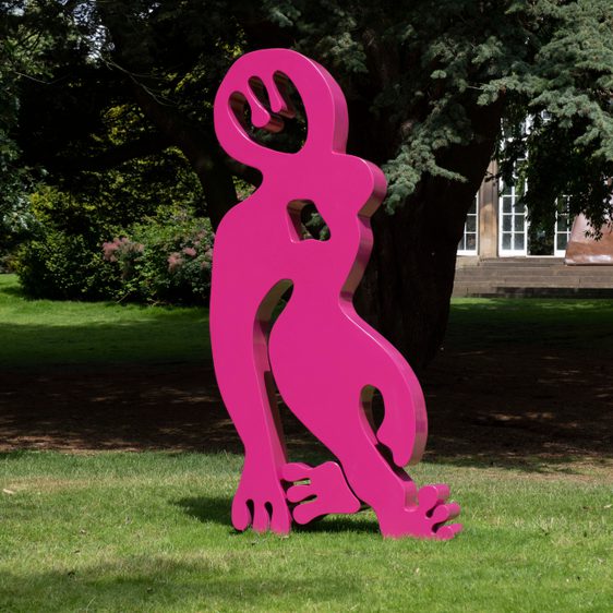A bright pink abstract sculpture