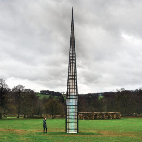A visitor looking up at Kimsooja – A Needle Woman 2014 at Yorkshire Sculpture Park