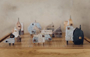 A display of miniature wooden houses