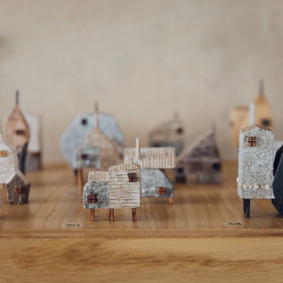 A display of miniature wooden houses