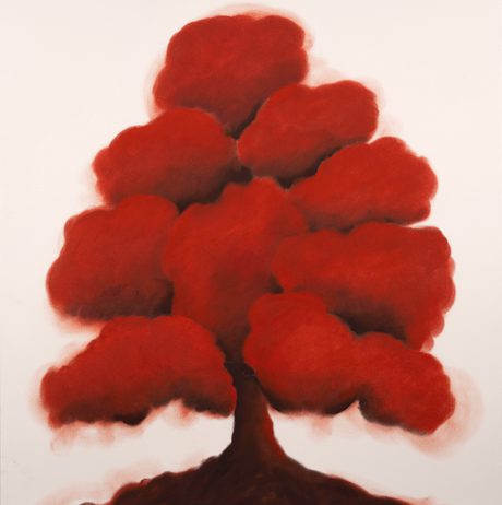 Pastel drawing of a red bushy tree on paper.