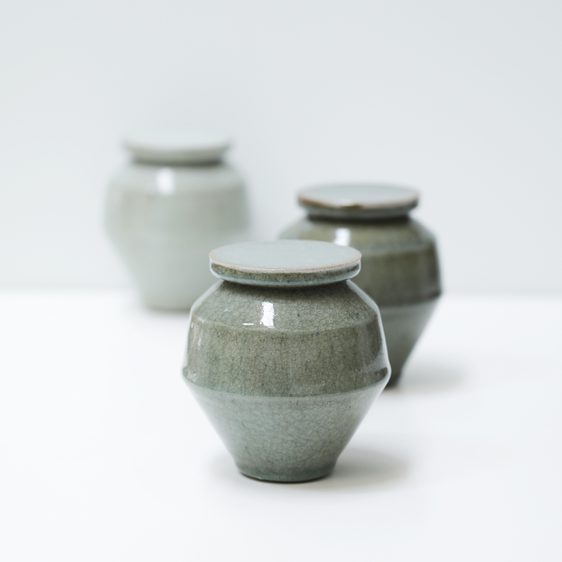 Three angular ceramic jars