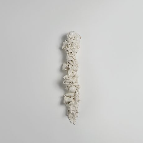 Porcelain sculpture hung on a wall of the Chapel at YSP.