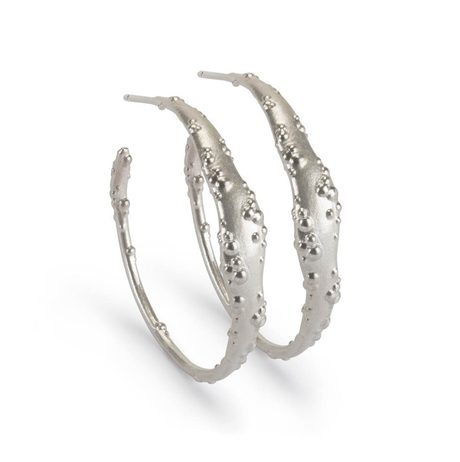 A pair of textured silver hoop earrings