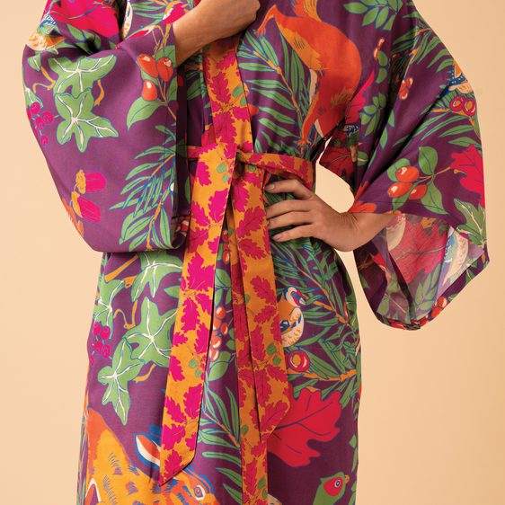 Multicoloured floral print dressing gown, modelled on a woman