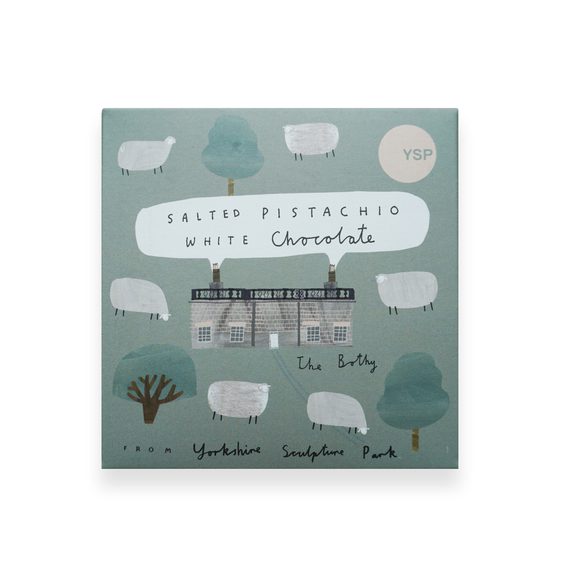 A square bar of chocolate, with illustrated packaging featuring sheep and trees.